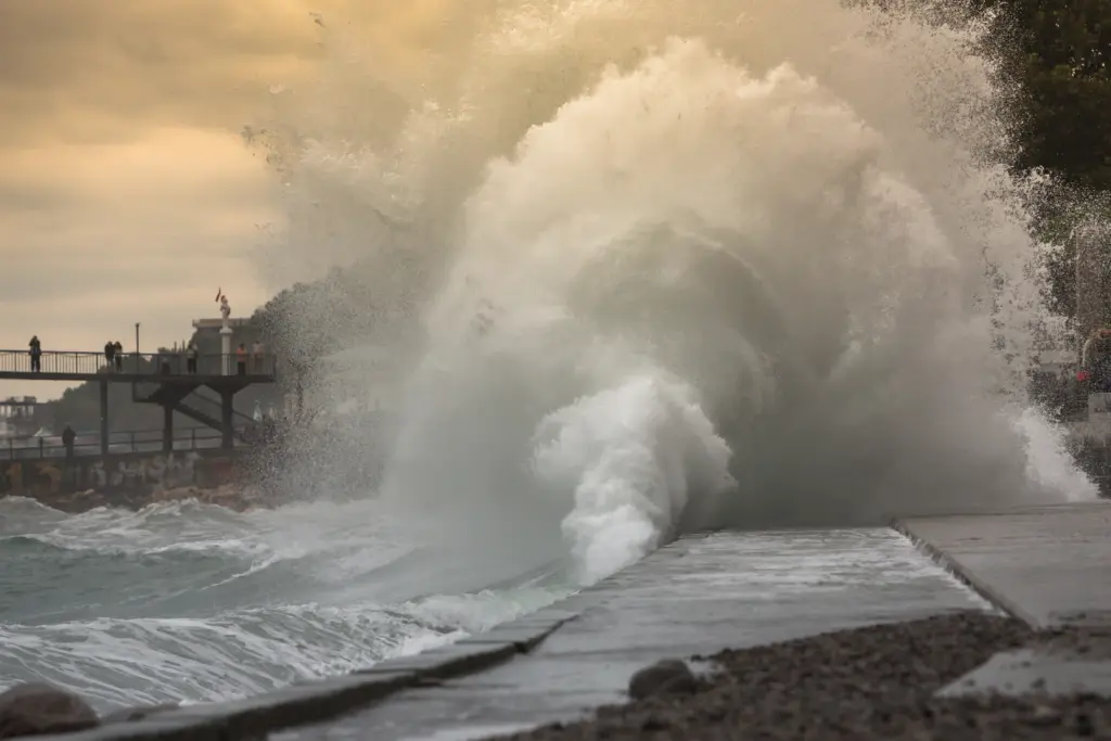 A tsunami, often misnamed as a "tidal wave," is a series of enormous ocean waves triggered by large-scale disturbances of the sea.